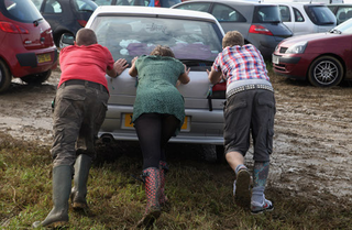 Illustration for article titled Mud: Glastonbury's Great Equilizer